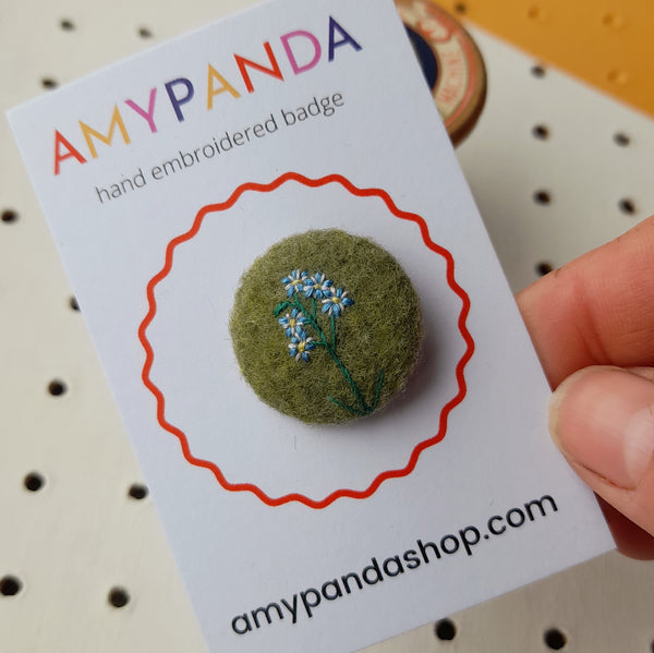 forget-me-not badge
