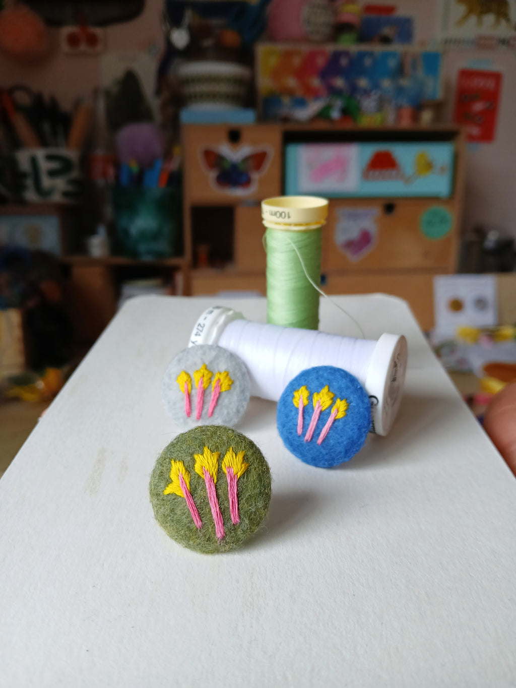 Rhubarb badge on blue - amypanda