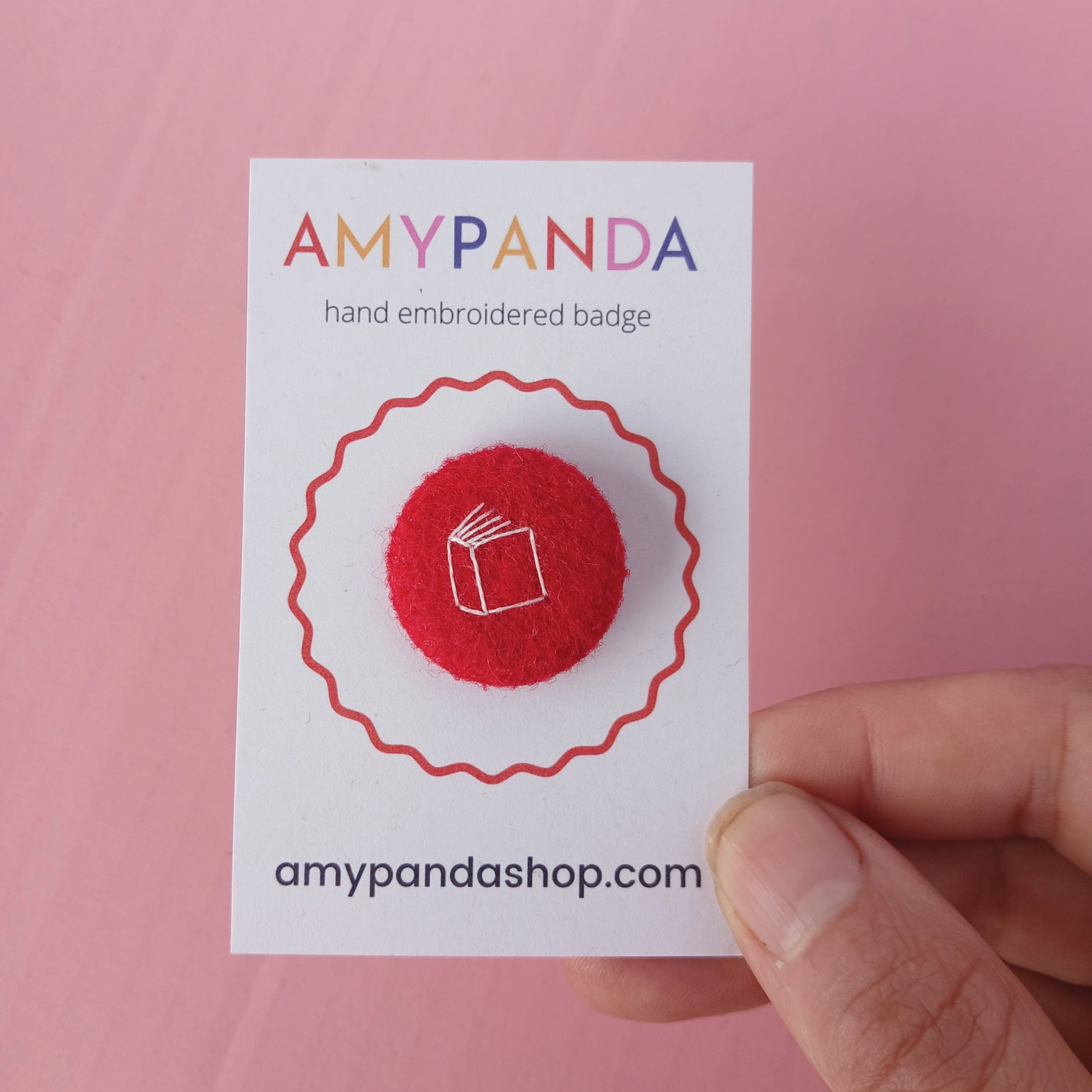 Three book badges