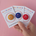 Three book badges