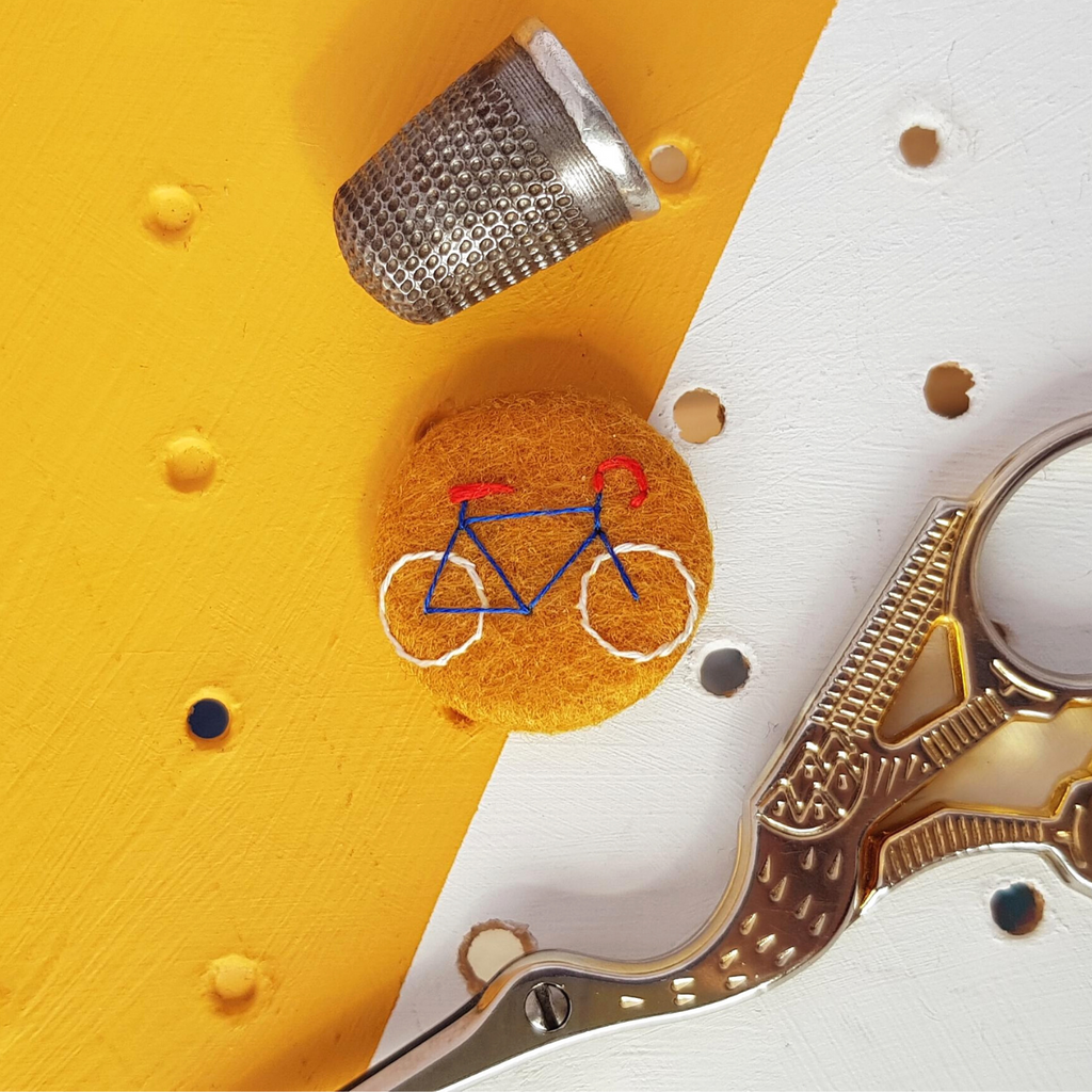 yellow bicycle badge - amypanda
