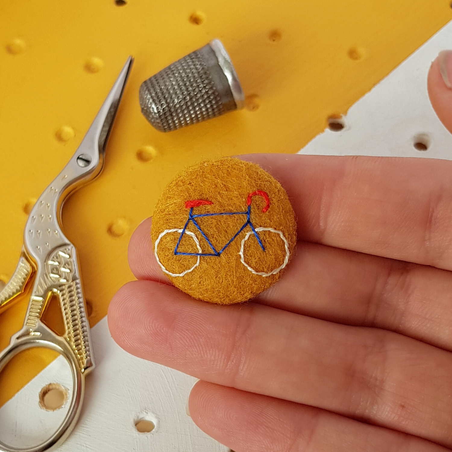 yellow bicycle badge - amypanda