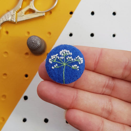 blue flower badge - amypanda