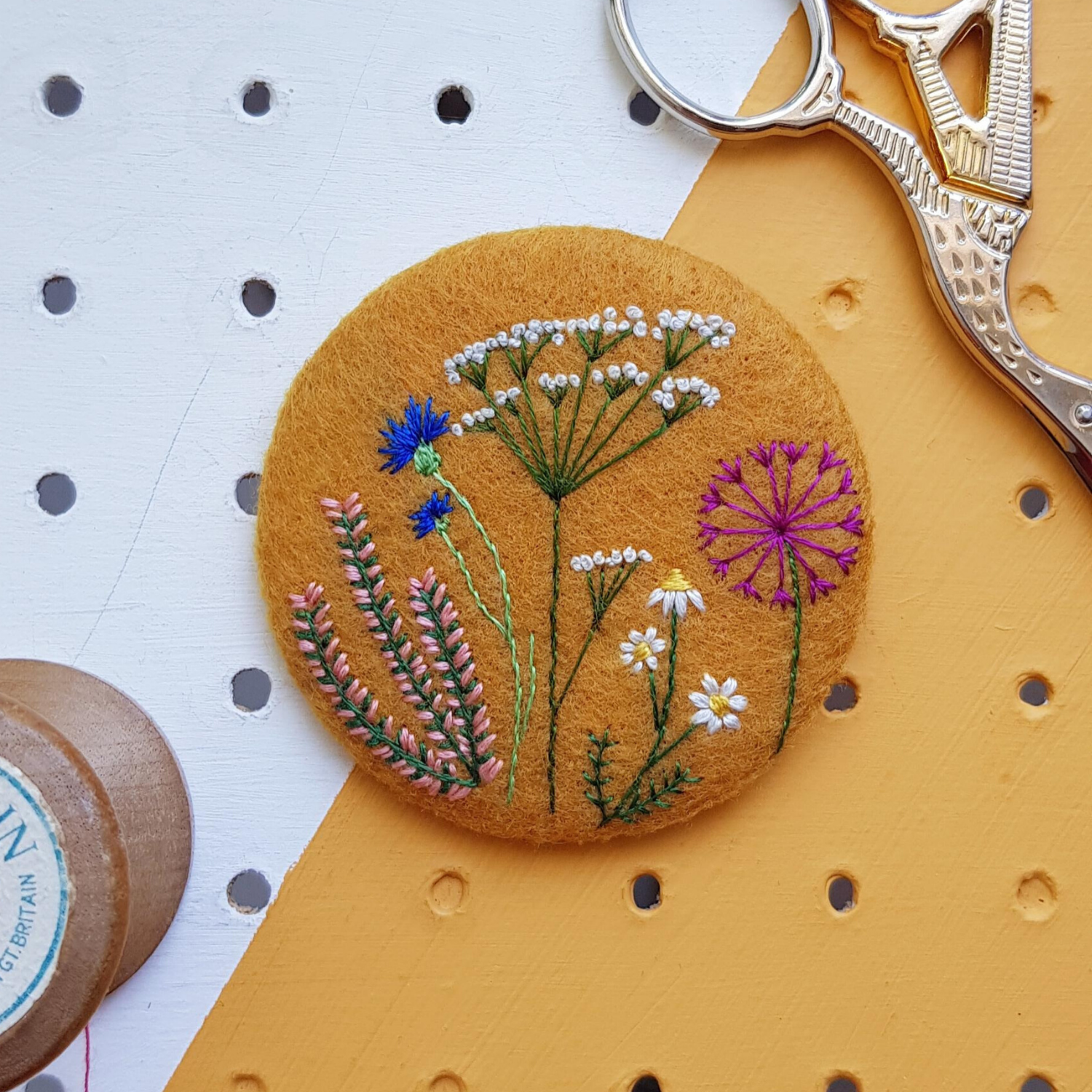 floral embroidered mustard yellow badge